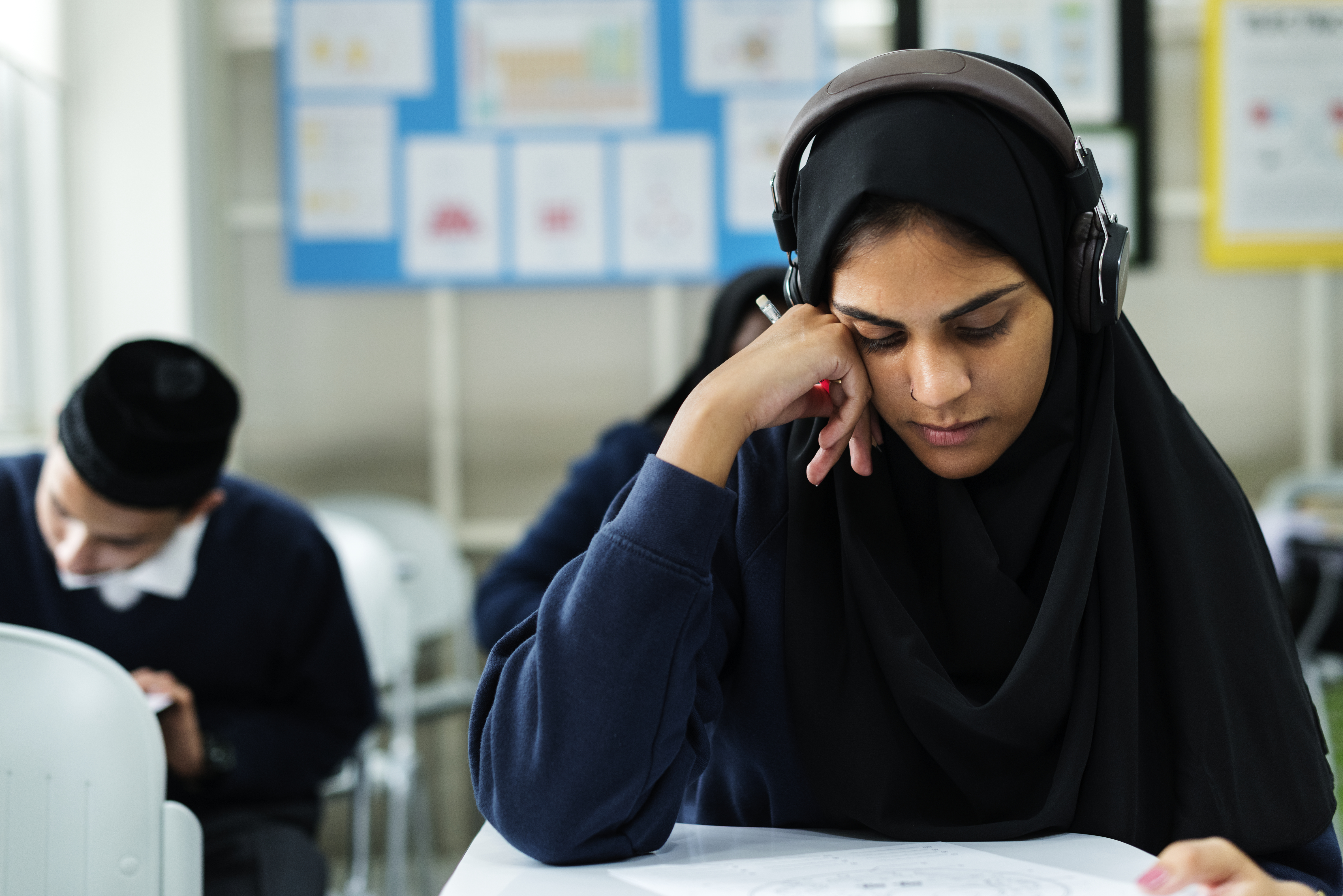 A student focused on her Islamic studies